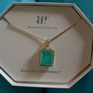 Elegant Gold Necklace with Green Pendant